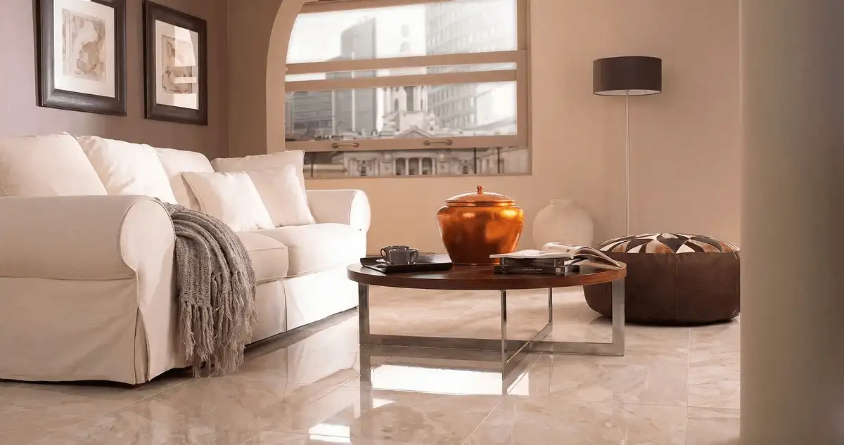 Modern living room with professionally installed marble flooring, a beige sofa, coffee table in Dallas, TX